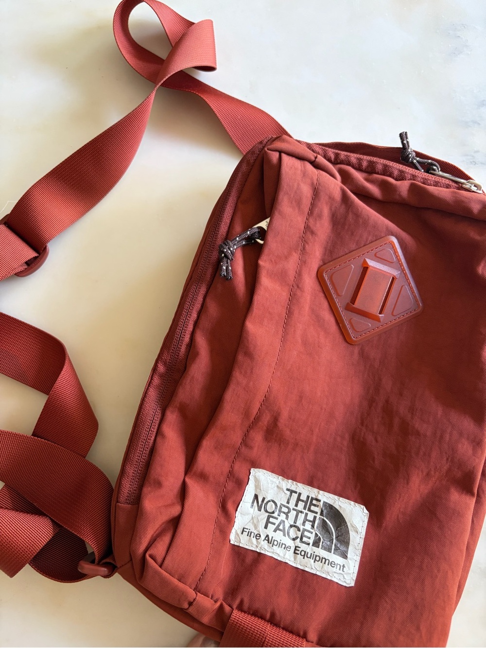 The North Face Men's Rust Red Sling Bag - Picture 1 of 6